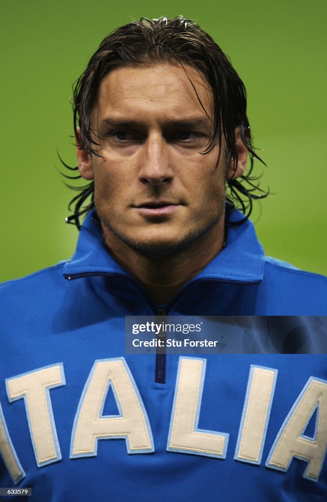 Francesco Totti Of Italy Lines Up For The National Anthems Before The francesco-totti-of-italy-lines-up-for-the-national-anthems-before-the