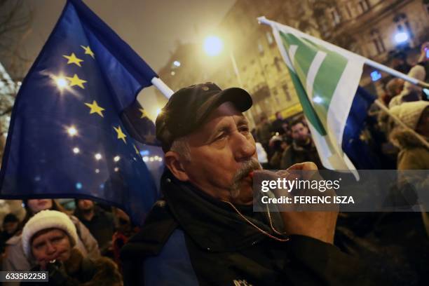 People protest against the visit of Russian President Vladimir Putin in Budapest on February 2, 2017. The Russian President is on brief visit to...