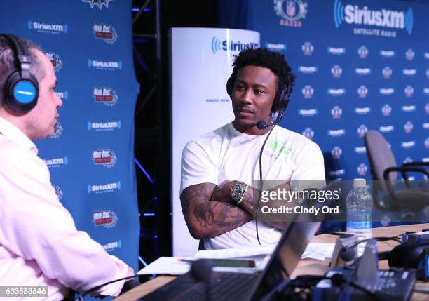 New York Jets wide receiver Brandon Marshall visits the SiriusXM set at Super Bowl 51 Radio Row at the George R. Brown Convention Center on February...