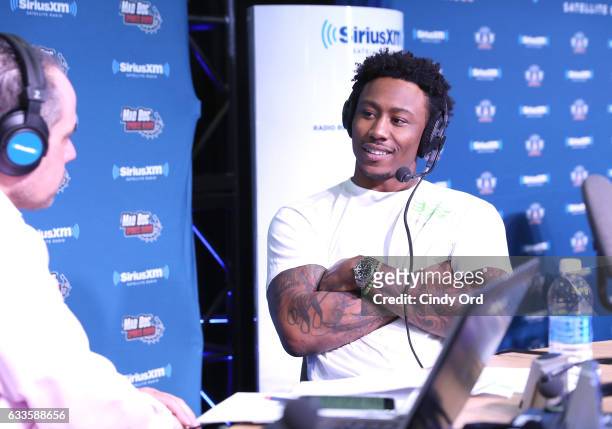 New York Jets wide receiver Brandon Marshall visits the SiriusXM set at Super Bowl 51 Radio Row at the George R. Brown Convention Center on February...