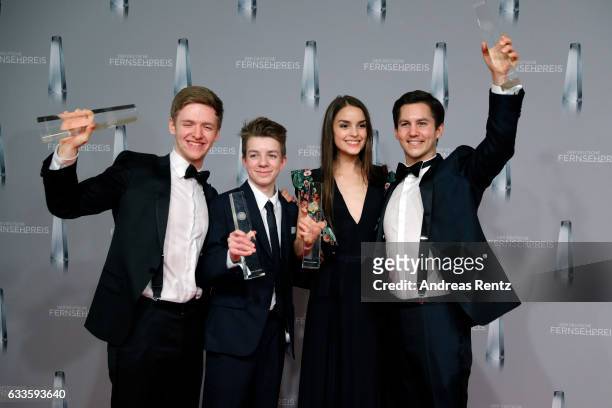 Timur Bartels, Nick Julius Schuck, Luise Befort and Ivo Kortland of 'Club der Roten Baender' pose with their awards at the German Television Award at...