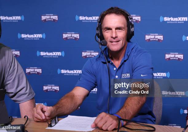 Former NFL player Doug Flutie visits the SiriusXM set at Super Bowl 51 Radio Row at the George R. Brown Convention Center on February 2, 2017 in...