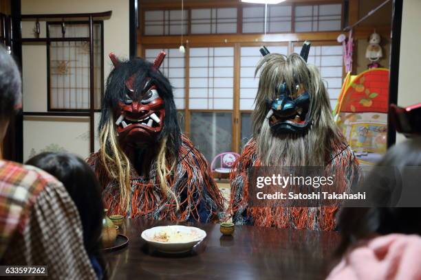 Namahage deities were given a warm reception by a family of Sugoroku district during the Namahage festival of traditional folk event on New Year's...