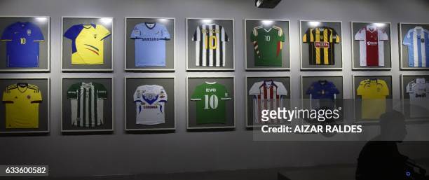 View of the gallery of football jerseys Bolivia's President Evo Morales has been given at the "Democratic and Cultural Revolution Museum" during its...