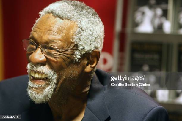 Former Boston Celtics player Bill Russell, who won 11 NBA Championships, signs his new book, "Red and Me: My Coach, My Lifelong Friend" at a...