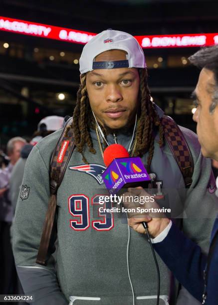 New England Patriots defensive end Jabaal Sheard is interviewed by a television station reporter during Super Bowl Opening Night on January 30, 2017...