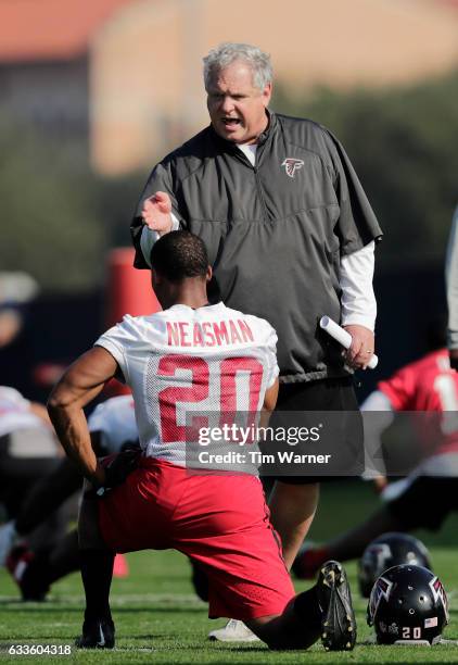 Defensive Coordinator Richard Smith of the Atlanta Falcons talks with Sharrod Neasman during the Super Bowl LI practice on February 2, 2017 in...