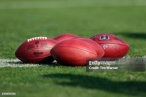 View of footballs with Atlanta Falcons logo along with the Super Bowl LI logo during practice on February 2, 2017 in Houston, Texas.
