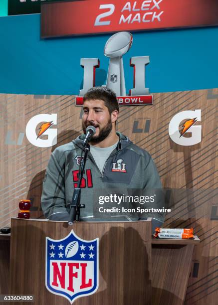 Atlanta Falcons center Alex Mack responds to questions from reporters during Super Bowl Opening Night on January 30, 2017 at Minute Maid Park in...