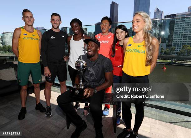 Usain Bolt, captain of the Bolt All-Stars poses with the Nitro Athletics Melbourne World Cup and Ryan Gregson of Australia, Matthew Wyatt of New...