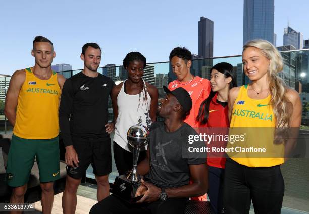 Usain Bolt, captain of the Bolt All-Stars poses with the Nitro Athletics Melbourne World Cup and Ryan Gregson of Australia, Matthew Wyatt of New...