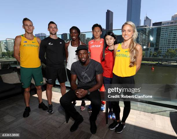 Usain Bolt, captain of the Bolt All-Stars poses with the Nitro Athletics Melbourne World Cup and Ryan Gregson of Australia, Matthew Wyatt of New...