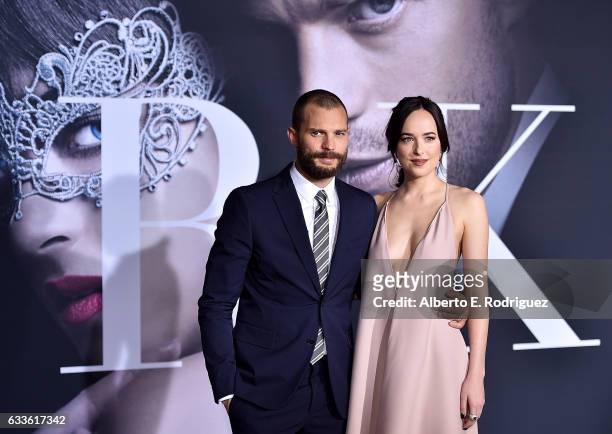 Actors Jamie Dornan and Dakota Johnson attend the premiere of Universal Pictures' "Fifty Shades Darker" at The Theatre at Ace Hotel on February 2,...