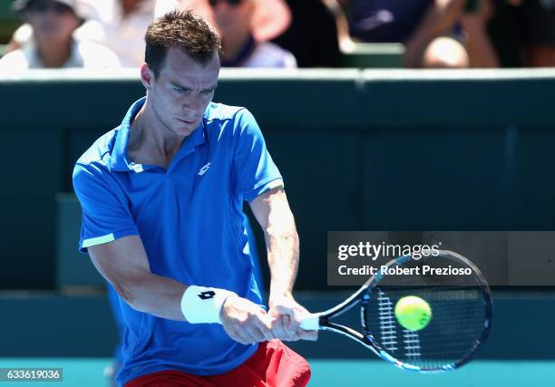 Jan Satral of Czech Republic plays a backhand in his singles match against Nick Kyrgios of Australia during the first round World Group Davis Cup tie...