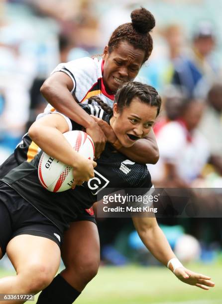 Theresa Fitzpatrick of New Zealand is tackled during the womens pool match between New Zealand and Papua New Guinea in the 2017 HSBC Sydney Sevens at...