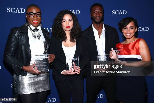 Actors Aisha Hinds, Jurnee Smollett-Bell, Aldis Hodge and Amirah Vann pose with their Cast Award for "Underground" backstage on Day One of aTVfest...