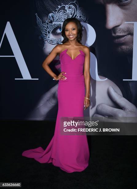 Actress Ashleigh LaThrop poses on arrival for the premiere of the film "Fifty Shades Darker" in Los Angeles, California on February 2, 2017. / AFP /...