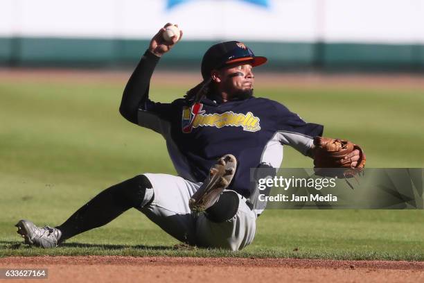 Freddy Galvis of Venezuela throws the ball during a game between Aguilas del Zulia of Venezuela and Criollos de Caguas of Puerto Rico as part of the...