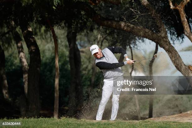 Andrew Dodt of Australia plays his second shot on the 13th hole during the second round of the Omega Dubai Desert Classic at Emirates Golf Club on...