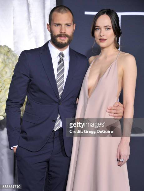 Actors Jamie Dornan and Dakota Johnson arrive at the premiere of Universal Pictures' "Fifty Shades Darker" at The Theatre at Ace Hotel on February 2,...