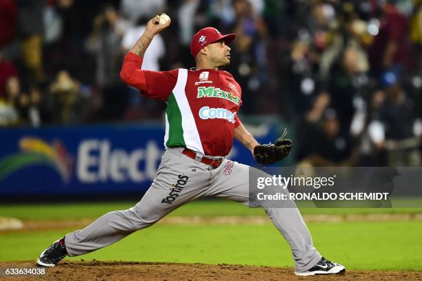 Fautino de los Santos of Aguilas de Mexicali from Mexico throws a pitch against Tigres de Licey from the Dominican Republic during the Caribbean...