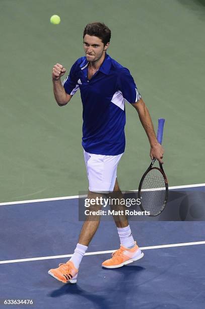 Gilles Simon of France celebrates winning his match against Yoshihito Nishioka of Japan during the Davis Cup by BNP Paribas first round singles match...