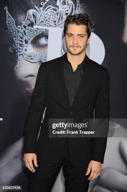 Actor Luke Grimes attends the premiere of Universal Pictures' 'Fifty Shades Darker' at The Theatre at Ace Hotel on February 2, 2017 in Los Angeles,...