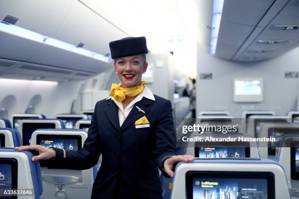 Airhostess of German airline Lufthansa, stands in cabine at the passenger deck of the company's first Airbus A350-900 passenger plane during a...