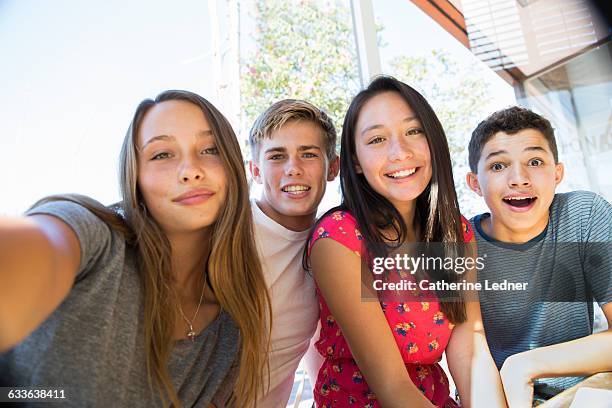 teens taking a happy selfie - girl selfie fotografías e imágenes de stock