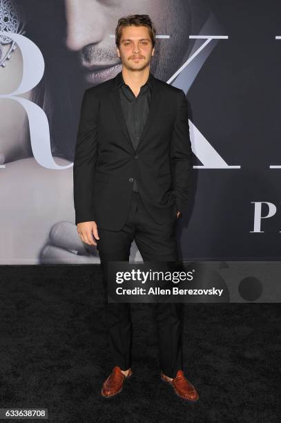 Actor Luke Grimes attends the Premiere of Universal Pictures' "Fifty Shades Darker" at The Theatre at Ace Hotel on February 2, 2017 in Los Angeles,...