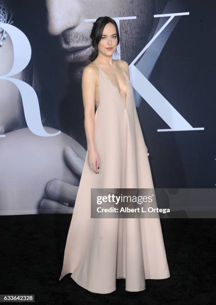 Actress Dakota Johnson arrives for the Premiere Of Universal Pictures' "Fifty Shades Darker" at The Theatre at Ace Hotel on February 2, 2017 in Los...