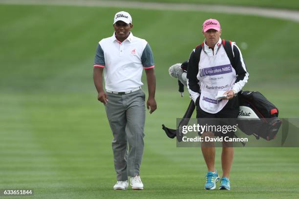 Amateur Rayhan Thomas of India walks down the 1st hole during the second round of the Omega Dubai Desert Classic at Emirates Golf Club on February 3,...