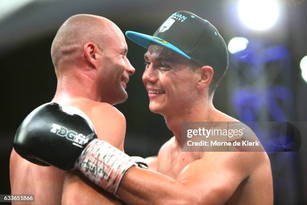 Australian boxer Tim Tszyu hugs Mark Dalby after their middleweight bout at Adelaide Oval on February 3, 2017 in Adelaide, Australia.