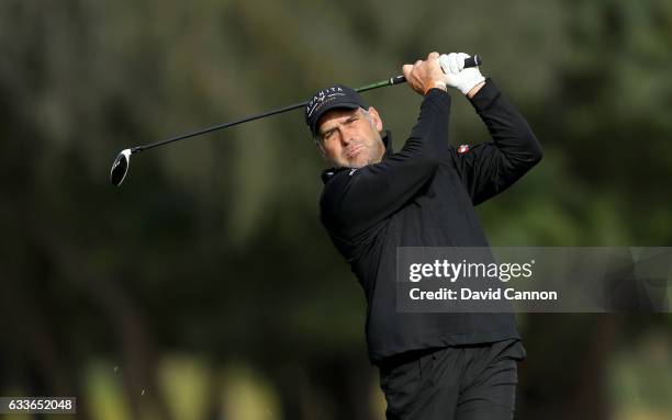 Hennie Otto of South Africa plays his second shot on the third hole during the second round of the 2017 Omega Dubai Desert Classic on the Majlis...