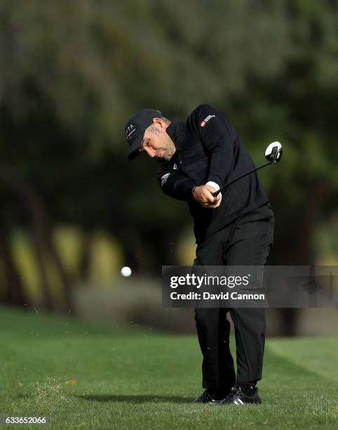 Hennie Otto of South Africa plays his second shot on the third hole during the second round of the 2017 Omega Dubai Desert Classic on the Majlis...