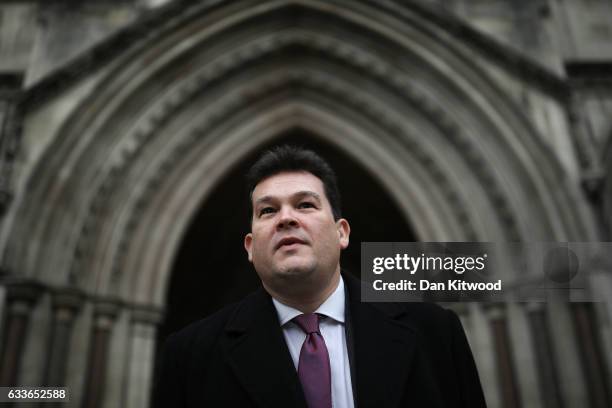 Adrian Yalland, Conservative lobbyist, poses outside the Royal Courts of Justice on February 3, 2017 in London, England. Mr Yalland and a Peter...