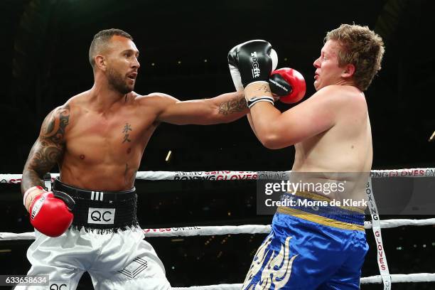 Quade Cooper and Jack McInnes fight during their heavyweight bout at Adelaide Oval on February 3, 2017 in Adelaide, Australia.