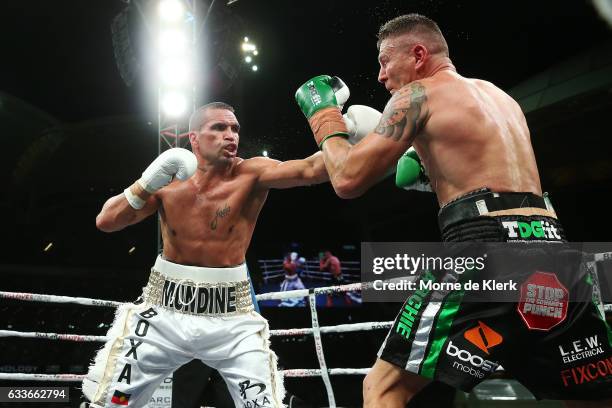 Australian boxers Anthony Mundine and Danny Green fight during their cruiserweight bout at Adelaide Oval on February 3, 2017 in Adelaide, Australia.