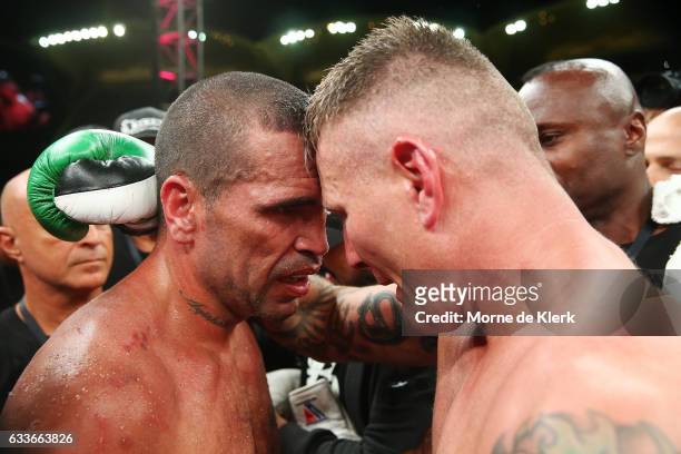 Australian boxers Anthony Mundine and Danny Green hug after their cruiserweight bout at Adelaide Oval on February 3, 2017 in Adelaide, Australia.