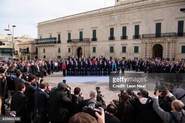Delegates from the EU Informal Summit gather for the family photo on February 3, 2017 in Valletta, Malta. Theresa May attends an informal summit of...