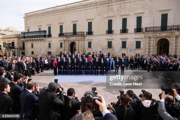 Delegates from the EU Informal Summit gather for the family photo on February 3, 2017 in Valletta, Malta. Theresa May attends an informal summit of...