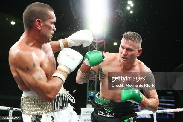 Australian boxers Anthony Mundine and Danny Green fight during their cruiserweight bout at Adelaide Oval on February 3, 2017 in Adelaide, Australia.