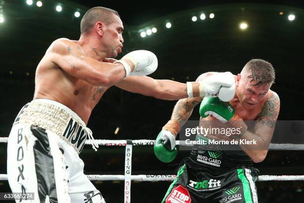 Australian boxers Anthony Mundine and Danny Green fight during their cruiserweight bout at Adelaide Oval on February 3, 2017 in Adelaide, Australia.