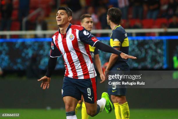 Alan Pulido of Chivas celebrates after scoring during a friendly match between Chivas of Mexico against Boca Juniors of Argentina, named Duelo de...