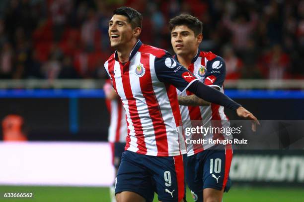 Alan Pulido of Chivas celebrates after scoring during a friendly match between Chivas of Mexico against Boca Juniors of Argentina, named Duelo de...