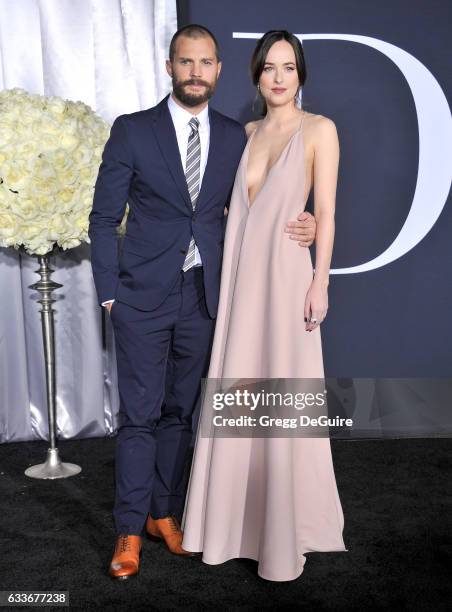 Actors Jamie Dornan and Dakota Johnson arrive at the premiere of Universal Pictures' "Fifty Shades Darker" at The Theatre at Ace Hotel on February 2,...