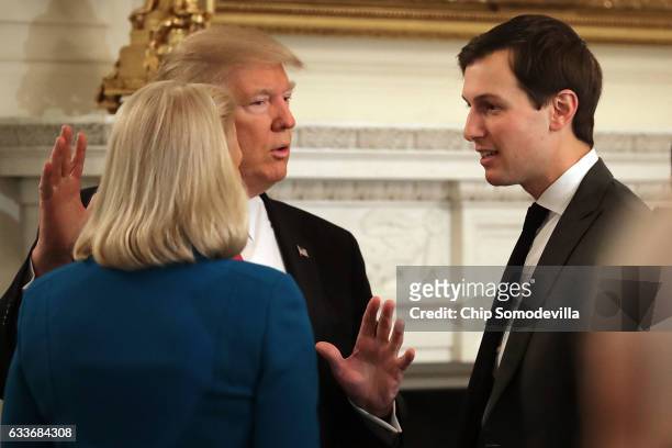 President Donald Trump and his son-in-law and Senior Advisor Jared Kushner talk with IBM CEO Ginni Rometty at the beginning of a policy forum in the...