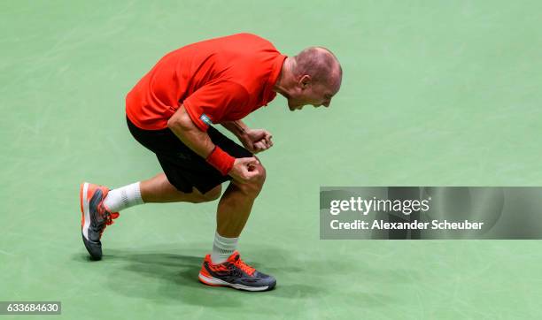 Steve Darcis of Belgium celebrates the victory against Philipp Kohlschreiber of Germany during day one of the Davis Cup World Group first round...