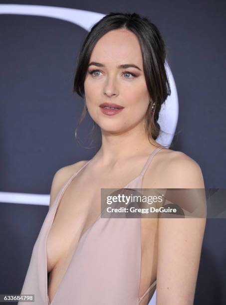 Actress Dakota Johnson arrives at the premiere of Universal Pictures' "Fifty Shades Darker" at The Theatre at Ace Hotel on February 2, 2017 in Los...