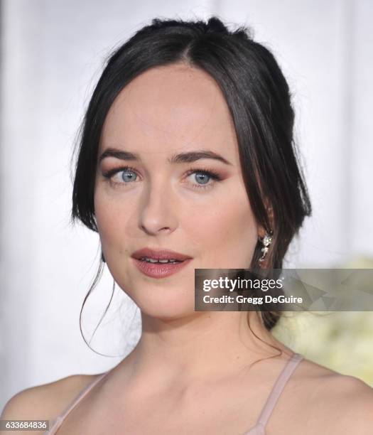 Actress Dakota Johnson arrives at the premiere of Universal Pictures' "Fifty Shades Darker" at The Theatre at Ace Hotel on February 2, 2017 in Los...